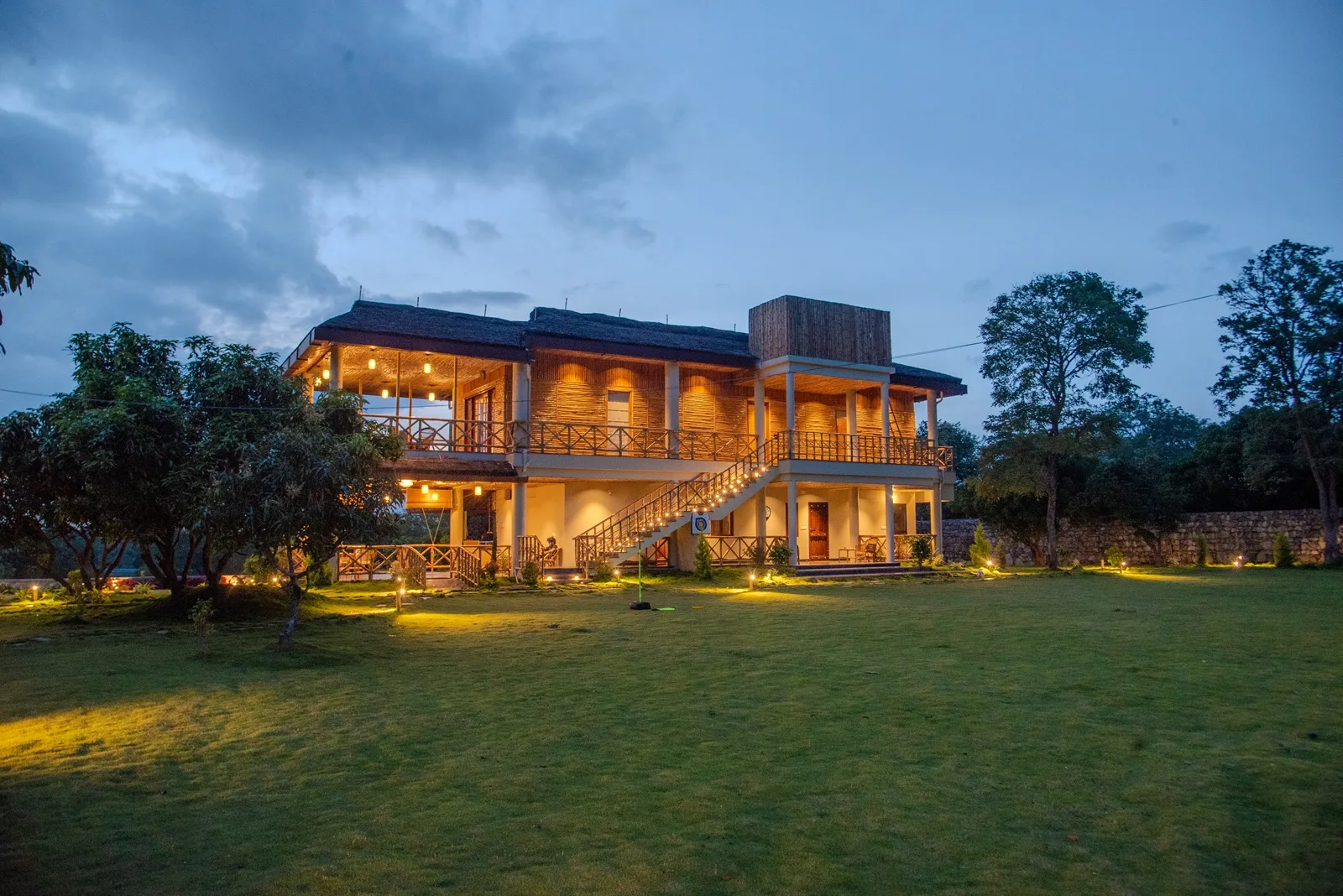 Jingle Woods Farmstay exterior at night